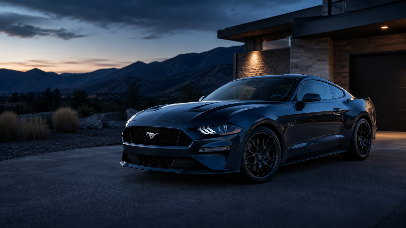 A completely clean and glossy dark blue Ford Mustang in a Colorado driveway